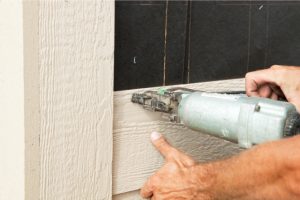 Installing House Siding onto Tar Paper Covered Wall